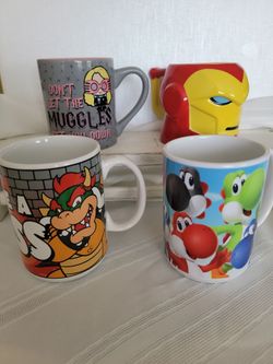 4 MISC MUGS MARVEL,HARRY POTTER AND NINTENDO ALL FOR 8.00 IN GREAT CONDITION