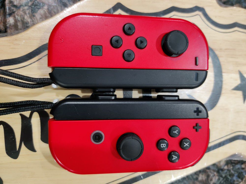 Mario Odyssey Red Nintendo Switch Joycons with straps