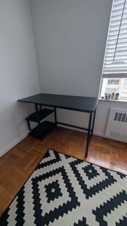 Black desk with shelves