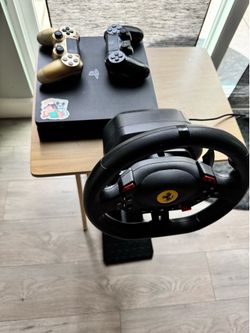 Ps4 slim+ racing wheel and games