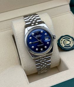 Rolex Datejust 1601 36mm stainless steel jubilee bracelet natural diamond blue dial white gold fluted bezel watch box appraisal