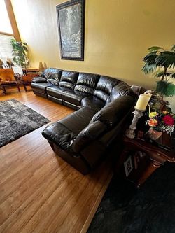 Leather living room set with two recliners