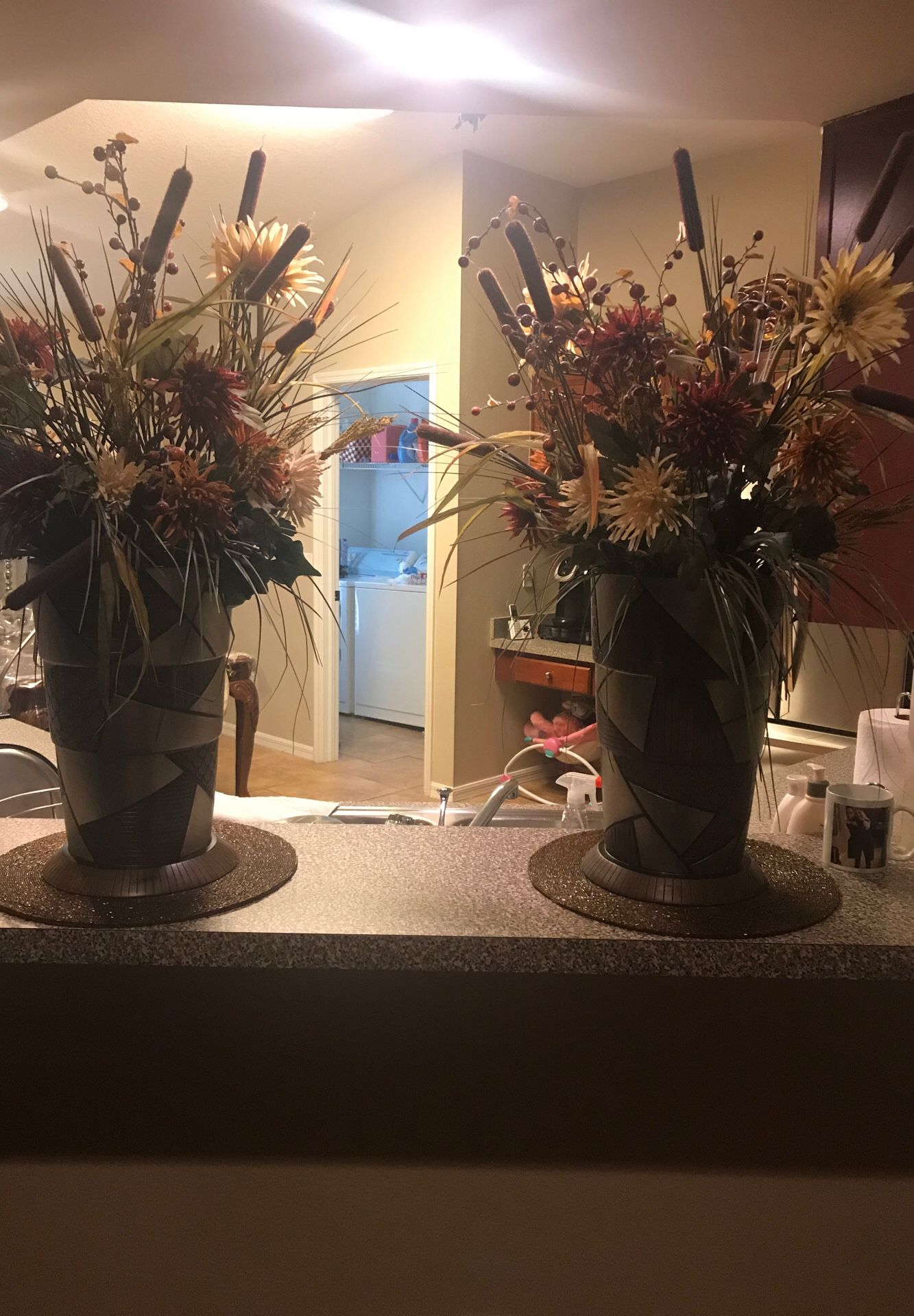Two vase with flowers