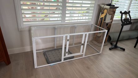 Acrylic puppy crate and pads