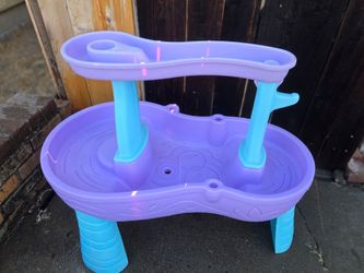 Pink and turquoise water table
