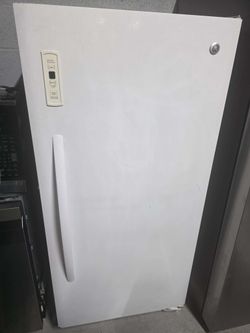 GE stand up-right Freezer 28in. Wide and 55in.tall.