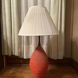 Mid-century / retro style textured heavily textured glaze) with an off-white pleated shade.