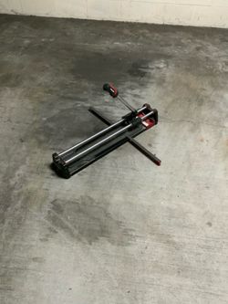 Tile cutter one time used