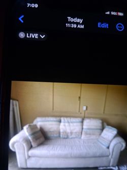 White Fabric Sofa with Throw Pillows