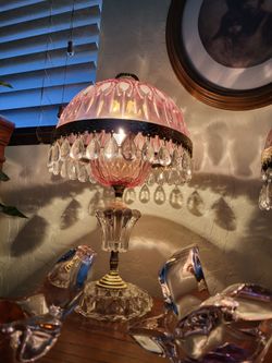 Antique crystal lamps, pink works perfect. Everything's put on them, no missing crystals. Each one is a hundred dollars.I have two left