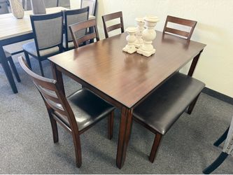 Dining table 4 chairs and a bench