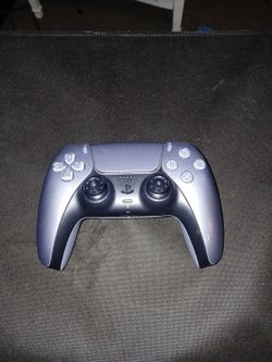 Black and Chrome Ps5 controller