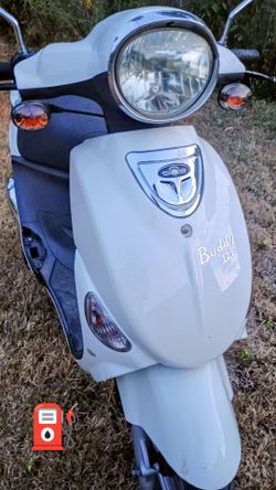 Firm price 125cc Adult Scooter with extras. NO Title