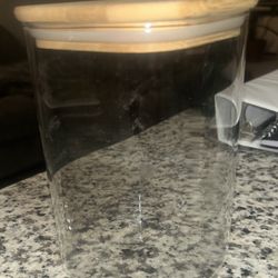 glass storage jar with an airtight bamboo lid