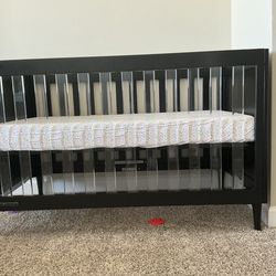 DELTA CHILDREN BOWIE 4-1 convertible crib put together, but never slept in