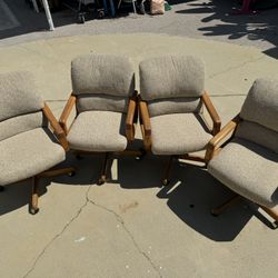 Set of 4 Vintage Wood Swivel Tilt Rolling Chairs
