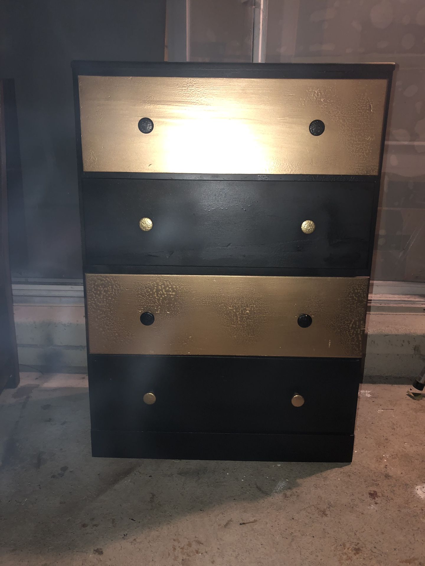 Gold and black painted dresser