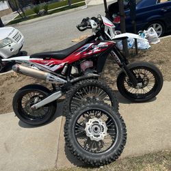 Two 2013 Husqavarna 510 1 Complete And Plated 1 Complete Parts Bike ( Because Parts Are Not Availible)