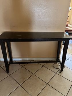 Console table with charging station