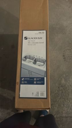 Glacier Bay top mount 33” double bowl kitchen sink
