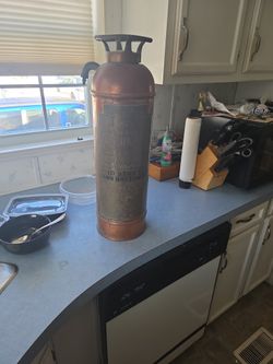 Antique fire extinguisher hose is missing