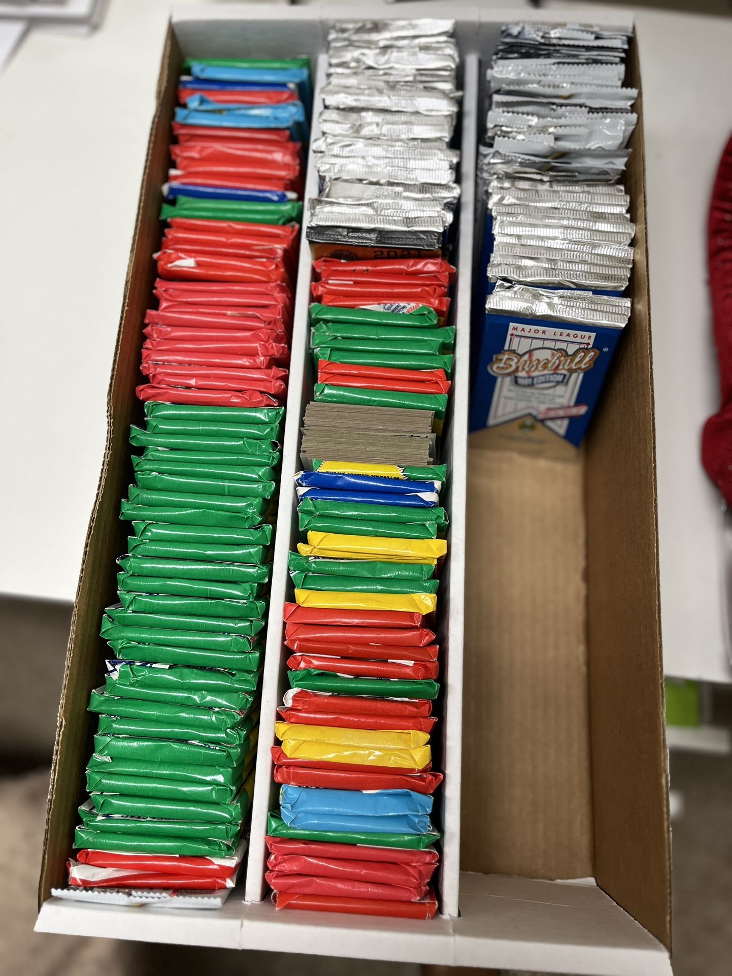 Box of Open Baseball Card Packs