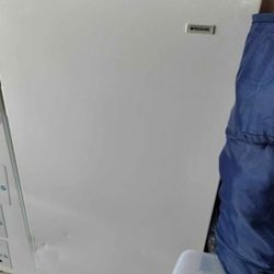 Moving Sale --Frigidaire stand up deep freezer 28x50.