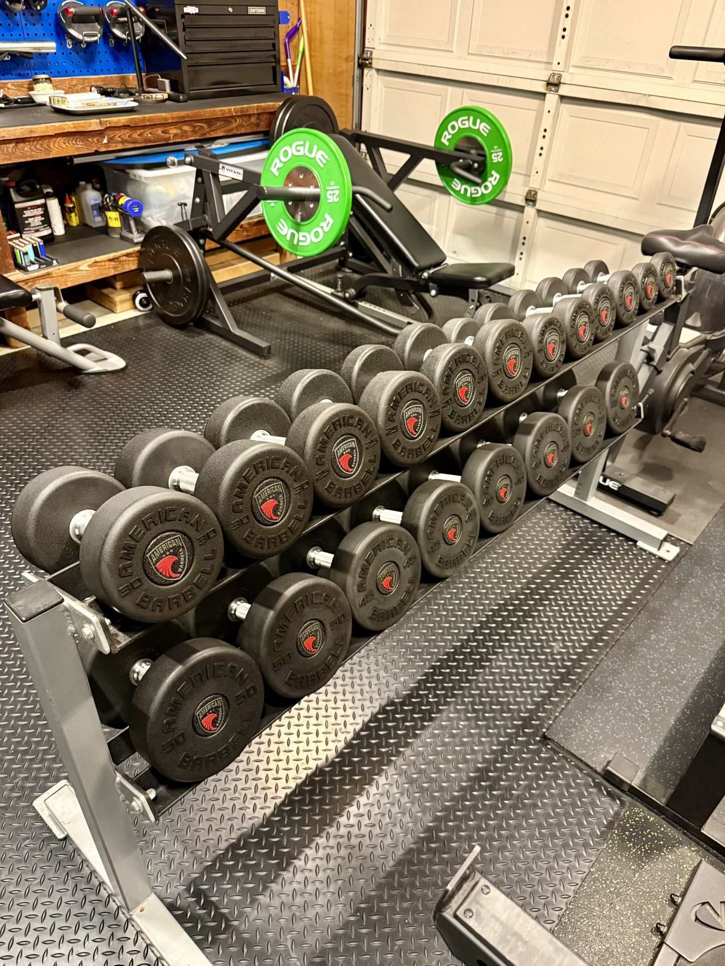 American Barbell Series 1 Urethane 5-50lb dumbbell set with 2 tier 70” rack LIKE NEW