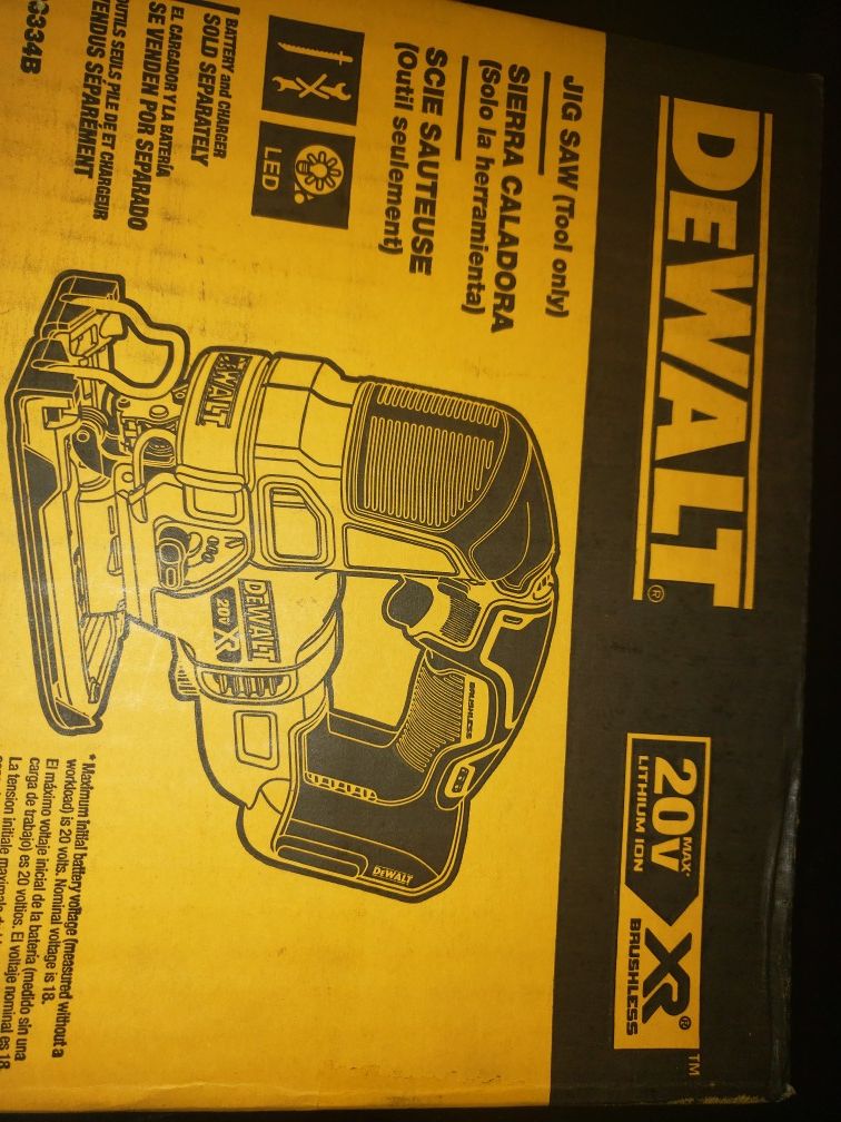 DEWALT XR JIG SAW NEW IN THE BOX NEVER BEEN OUT OF THE BOX.