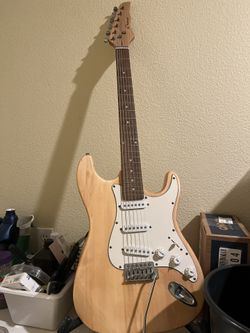 electric guitar with amp