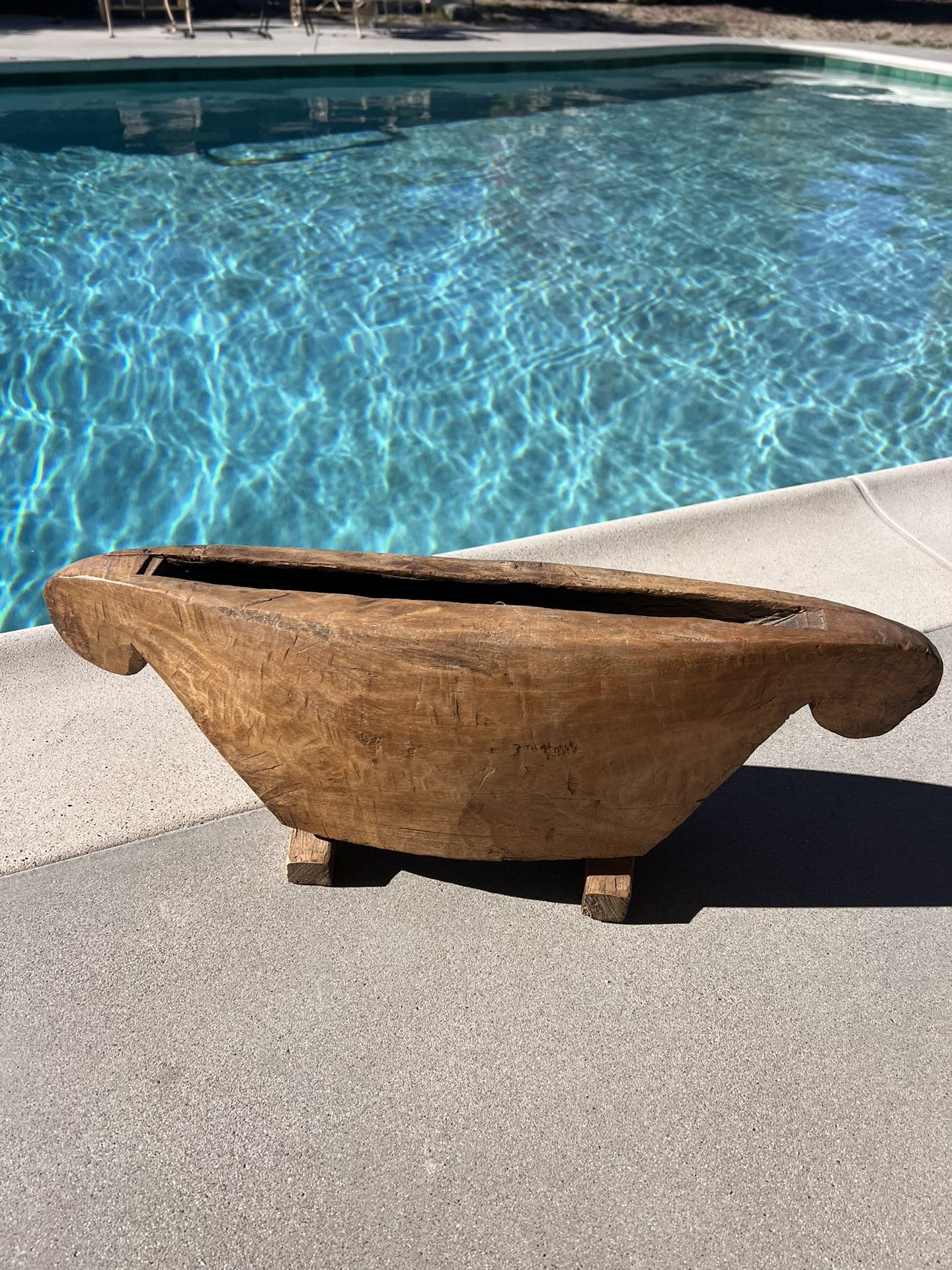 Large, hand-carved wooden slit drum;