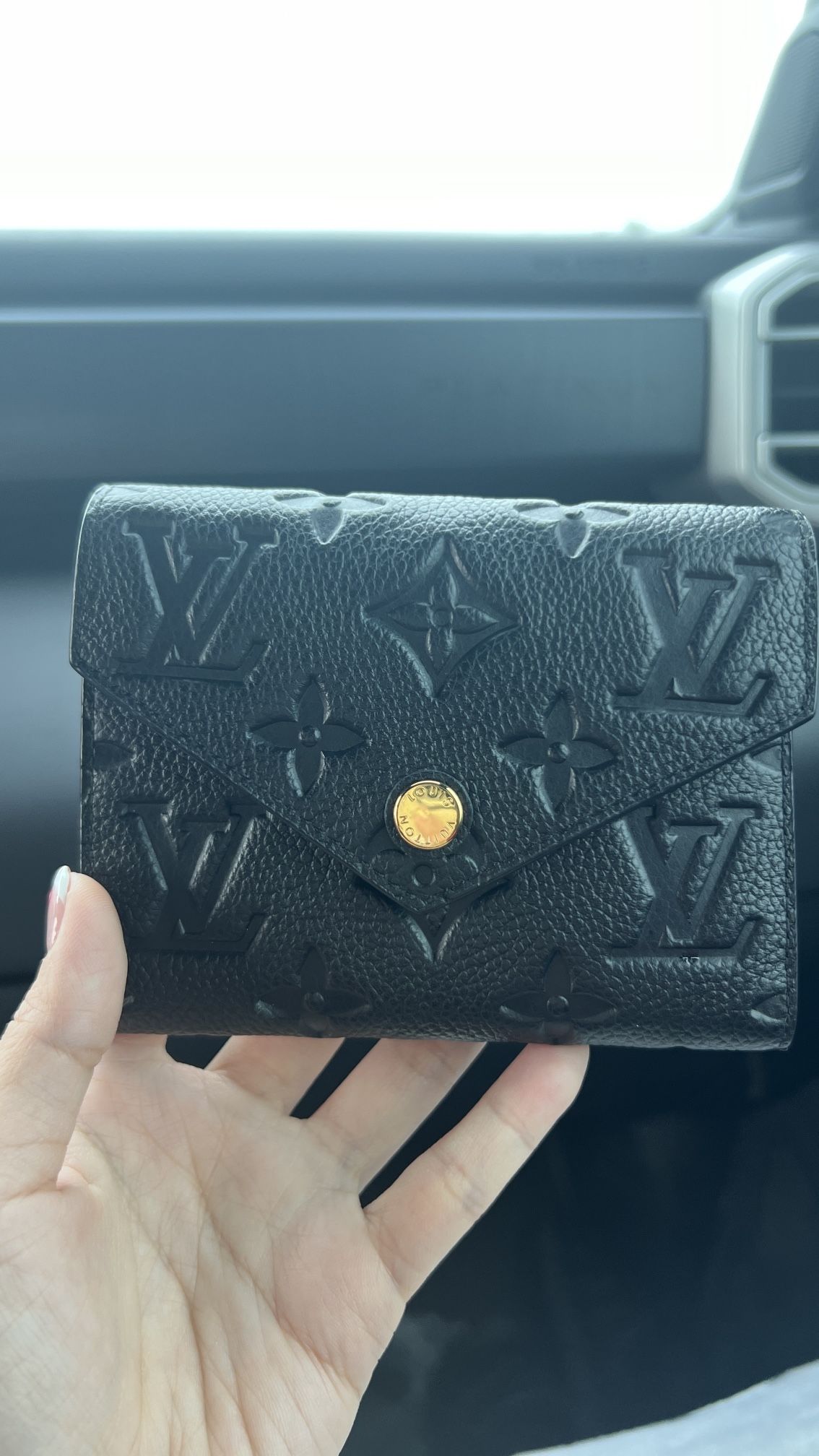 Louis Vuitton Victorine Wallet in Monogram Empreinte leather