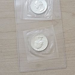 Two (2) UNCIRCULATED  mint State Silver Quarters 