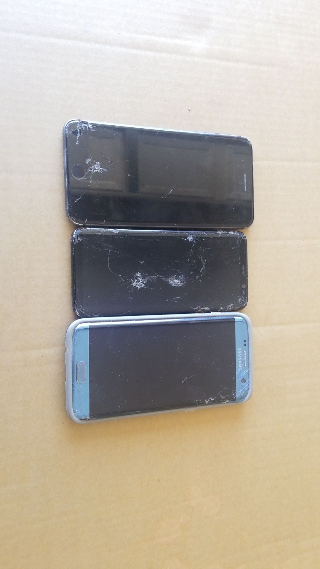 3 broken phones for parts