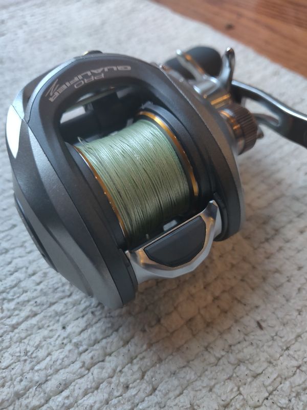 Bass Pro Shops Pro Qualifier bait caster right hand, retail 100 for