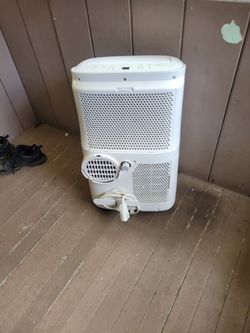 Portable air conditioner with remote