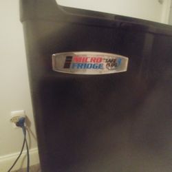 Mini fridge,almost new