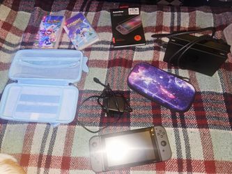 Nintendo Switch, 2 Games, TV Adaptor, Charger & Screen Protector