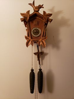 Very unique Antique 8 day Cuckoo clock. Clock has been completly serviced, cleaned, oiled and adjusted.