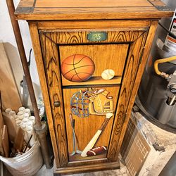Storage cabinet with a baseball themed collage