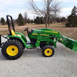 John Deere 4x4 Tractor & Loader