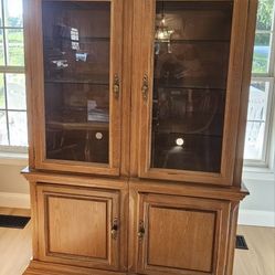 (2)Dining room/living room china cabinets, solid wood,  lighted w/ glass shelves and storage below