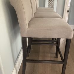 Upholstered counter stools, dark wood legs set of 4