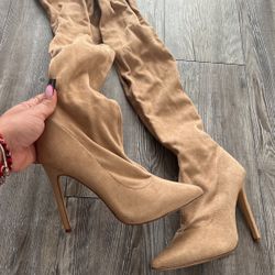 Woman’s Thigh High Heel Boots 