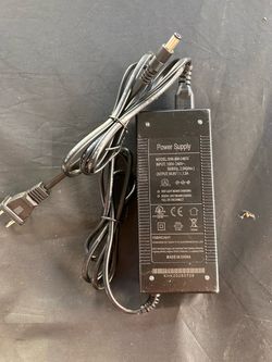 a 54.6V 1.5A lithium-ion battery power adapter (Model: XHK-5) designed for 48V electric scooters or bikes. [1] (https://offerup.com/redirect/?o=aHR0cH