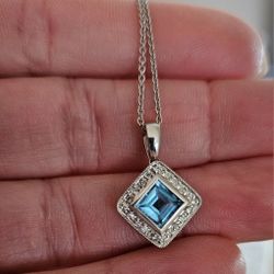 14k White Gold Diamond and Blue Topaz Pendant 