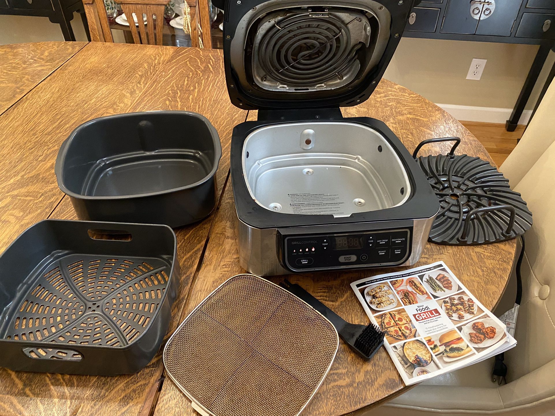 Ninja Foodi 4-in-1 Indoor Grill with 4-Quart Air Fryer, Roast, & Bake,  AG300 for Sale in Navarre, FL - OfferUp