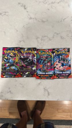 4 packs pokemon (2) pitch black (2) chaos rising brand new factory sealed