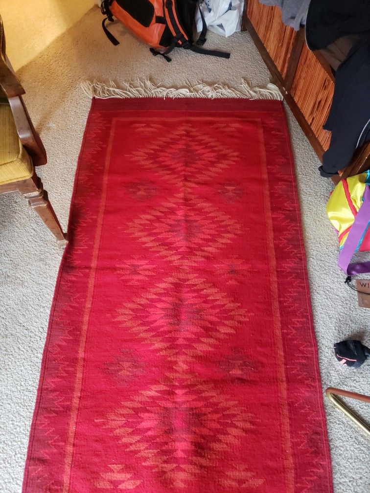Hand woven Navajo pattern rug