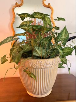 Pot with artificial plant